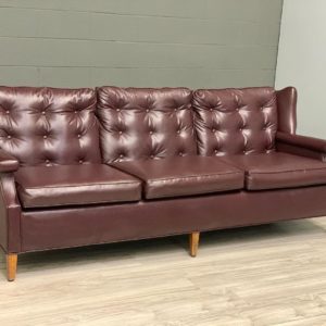 Real Vintage Plum colored Tufted Sofa